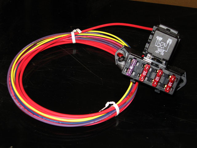 IMG_3194 To simplify the electrical wiring, we utilized Painless Performance Products' "Cirkit Boss" 3 circuit fusebox/relay.