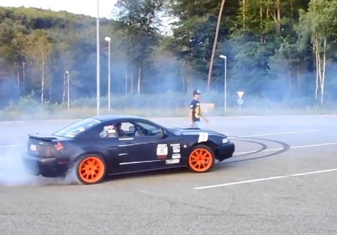 Video: Mustang Does Donuts Around Walking Man
