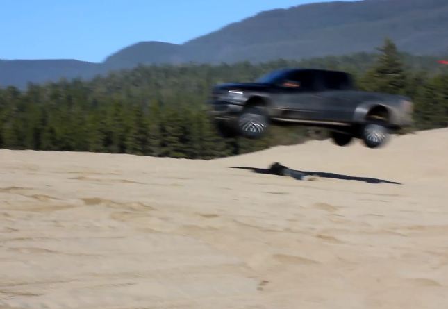Video: Ballsy Guy Lets Friend In Raptor Jump Over Him