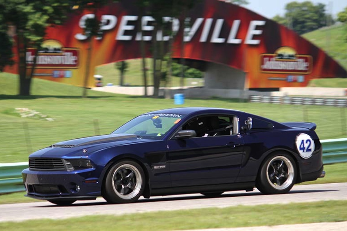 Video: Lapping Road America In a Supercharged V6 Stang
