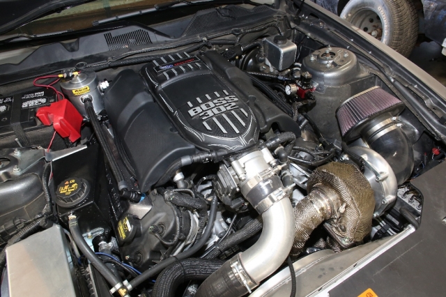 The finished product puts a bit of bling in our engine compartment, but more importantly, it keeps the oil out of our turbocharged mill.