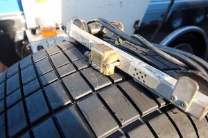 A siping tool holds multiple razor blades to help ease the work load when siping a set of tires. Generally, you want to set the blade depth so that they cut no more than half way though the depth of the tread block.