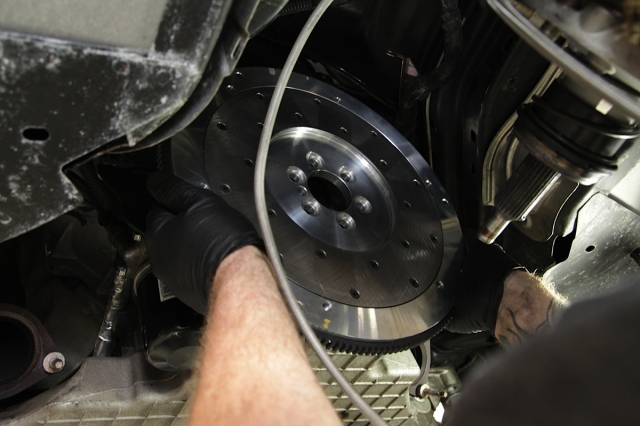 Six bolts remove the flexplate from the rear of the engine.