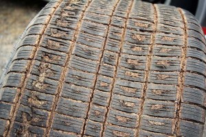 This is what happens when high horsepower and lots of grip combine to overpower a tire. This tire shows an extreme amount of chunking, but it held up through the feature and did its job.
