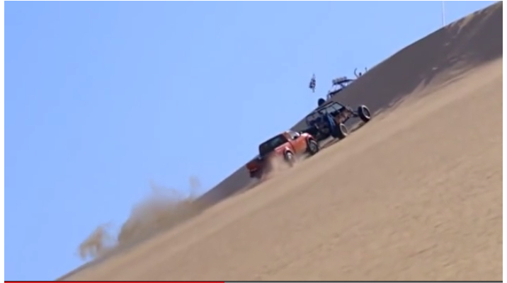Nissan In Hot Water Over Ad Depicting Frontier Pushing Buggy Up Dune
