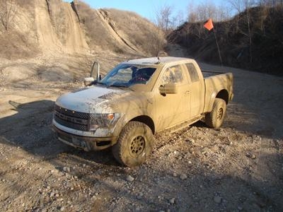 VIDEO: Automotive Journalists Get Stuck In Muddy Raptor During Test