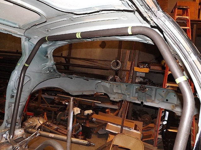 PMR mocked up the main hoop and got some of the initial bends in place. You can see the rear framerails have been temporarily removed to make way for the 25.5 chassis build.