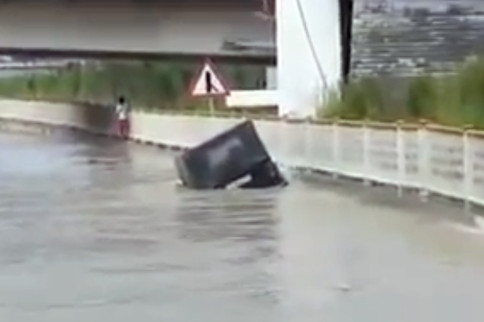 VIDEO: Russian Driver Attempts To Cross Flooded Street ... And ...