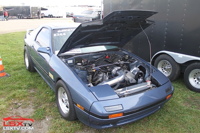 Steve Verplank's LSX Rumble Mazda RX-7 has forsaken rotary power for an iron-block 408 LS, boosted by a ProCharger F-1R supercharger and backed by an RPM 'glide. The 71-year-old driver says that now that he's upgraded from the previous D1 blower, the car makes 730 horsepower to the wheels of this 2,850 pound rocket. He's looking for an 8.70 this weekend in his first outing with the new blower.