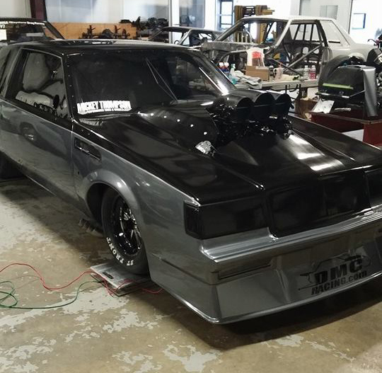 DMC Racing posted this photo of the beastly Buick sitting on the scales and getting all checked out a few days ago, after GregZ Designs laid down the new black and silver wrap.