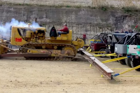 Video: One Diesel Caterpillar vs. Twenty Toyotas. Any Bets?