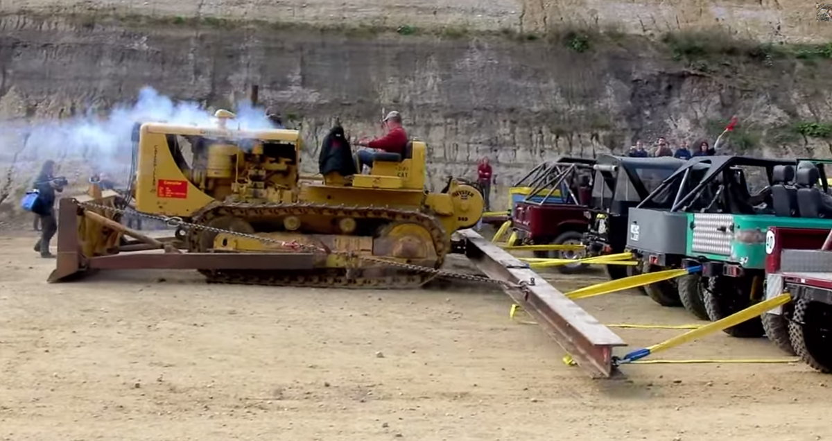 Video: One Diesel Caterpillar vs. Twenty Toyotas. Any Bets?