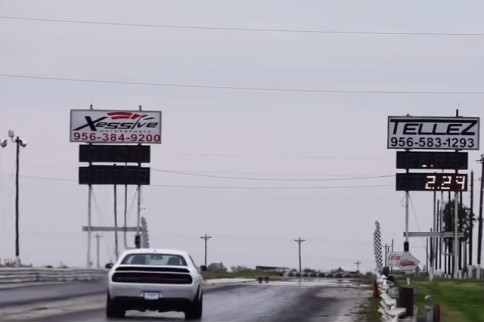 Bone Stock Challenger SRT Hellcat Posts 11.05 Quarter Mile Pass
