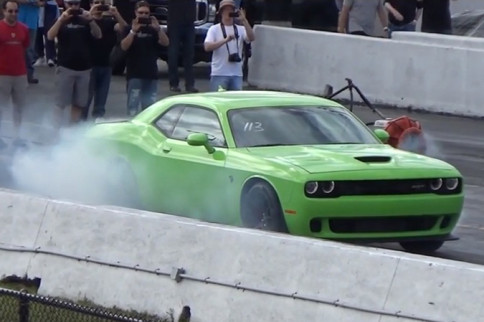 Video: Hellcat Challenger Takes On A Tesla, Then Blows It Big Time