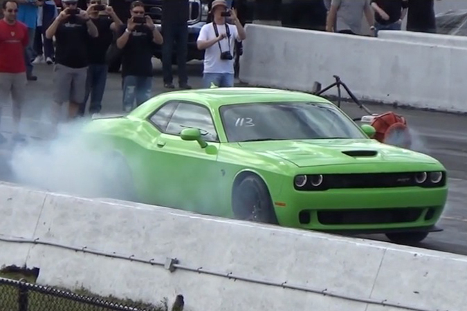 Video: Hellcat Challenger Takes On A Tesla, Then Blows It Big Time