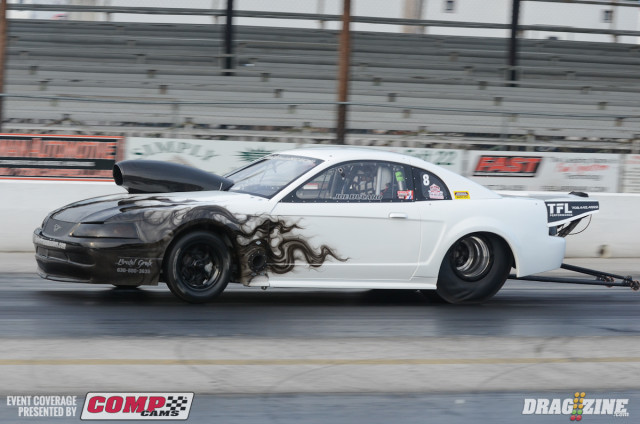 Joe Bucaro, with he fresh new paint scheme he debuted this season on his 2004 Mustang, leads Nitrous Pro Street by a mere two-thousandths of a second -- his 7.249 leading Don Baskin's 7.251.