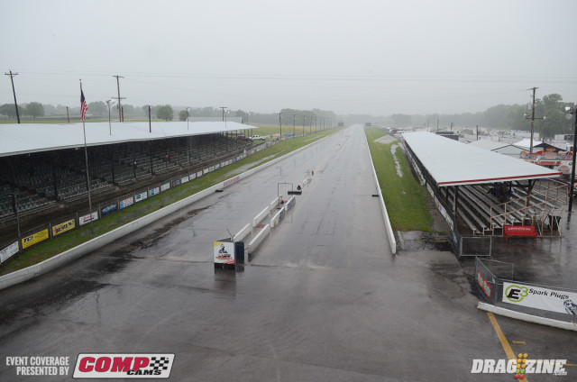 Well, this isn't the way you want to start a busy day of drag racing. The forecast for this weekend had turned from bleak to so-so as the week progressed, but today's 50% chance of showers was a little off the mark, as racer awoke to driving rains this morning. As of a little after 11 a.m. local time, the rain is still coming down and no decision has been made about today's program as of yet.