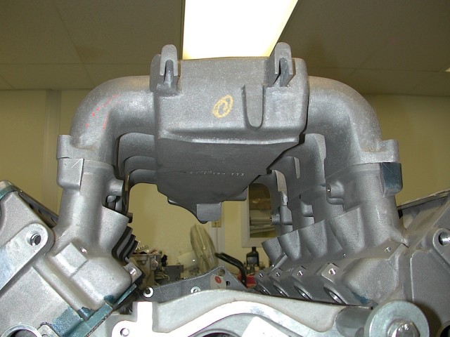 Another one of one part - the lone surviving intake manifold. 
