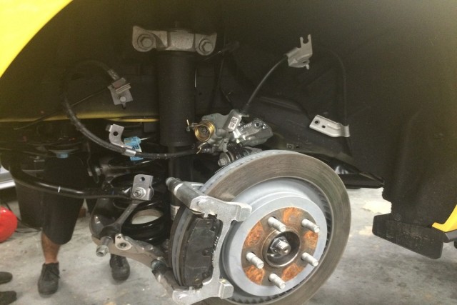With an IRS suspension, to remove the half shafts, many components have to be removed.