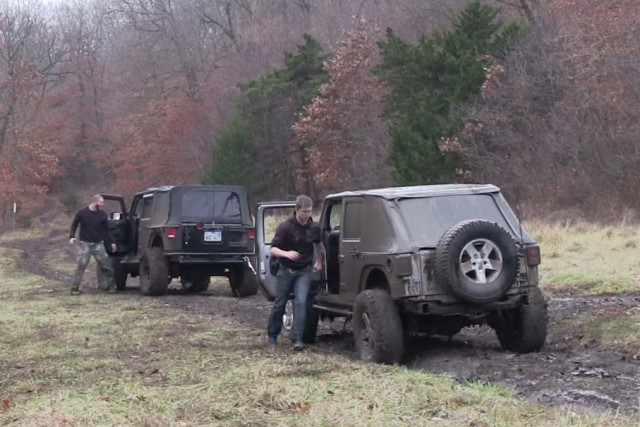 Driver of stuck JK mud free.