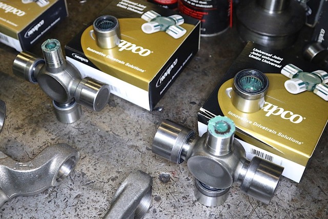 Notice the size difference between the ujoint trunnion diameter on the 1410 on the left and the 1480 on the right. The trunnion is the boss that the bearing cap rides on.