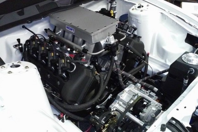 The engine uses a Hogan sheet metal intake to inhale air from a Vortech YSi supercharger. Behind the built Four-Valve is a M&M Transmission Turbo 400 with an Ultimate Converter Concepts stall converter. 