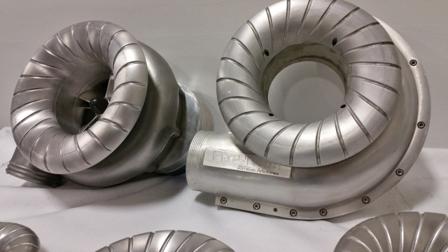 Seen here on the right is the billet volute design SME tested. It worked to build power down low, but was ultimately deemed unsuitable for production.