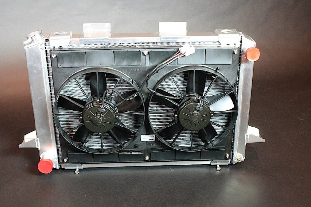 While we're definitely aware Project Track Attack's Be Cool module isn't for an LS swap, we wanted to include the image anyways to highlight the similarities in the LS swap modules. Our Be Cool radiator module is rated at 700 horsepower, included dual 11-inch SPAL fans, and an optional 7-plate cooler for our automatic transmission. Also included were the aluminum mounting brackets, wiring harness and dual 40-amp relays, and an aluminum recovery tank.
