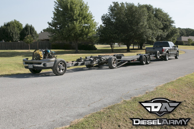 Once the bed was ready to go on, the chassis was loaded on the trailer, dropped off on the street, and reloaded the other direction.