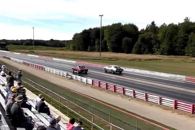 Shortly after the 100 foot mark the Vette takes the lead. 