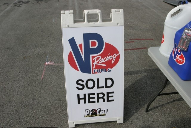 This is the sign you need to look for when purchasing race fuel. The distinctive VP Racing Fuels' red, white, and blue colors signifies you've come to the right place. At the most recent NMCA Finals at Summit Motorsports Park in Norwalk, Ohio, ProCar Associates' Christopher Wright marketed VP's array of racing fuel offerings; filling racers and spectators alike in on the details of each fuel.