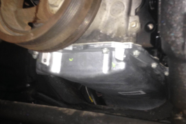 Showing the reduced clearance oil pan he had to use. 