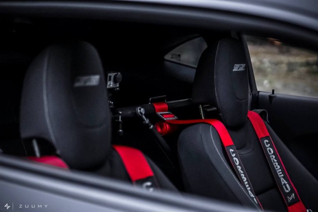 With a car built to handle the twisties, racing harnesses are a good idea to keep you in the seat during spirited driving. Of course, the Go-Pro is on board to record such exploits.