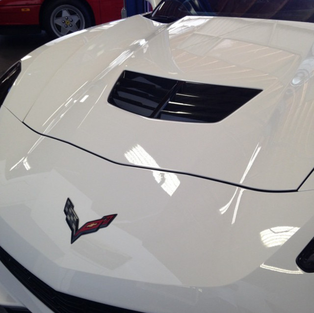Progress on the hood of a 2015 Corvette.