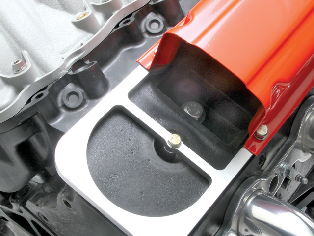 Cutaway shot of the valve cover showing the adapter components.