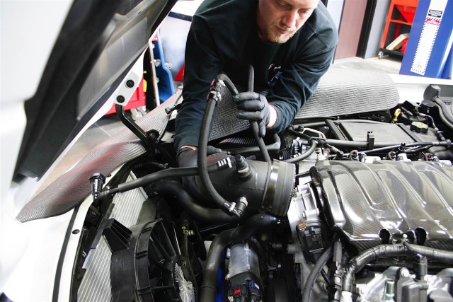 To begin, we had to say goodbye to our tried-and-true K&N intake system. To provide access for the new intake tubing, intercooler, and the supercharger itself, the bumper cover, fender liners and splash guards, and the radiator fan all get temporarily removed.