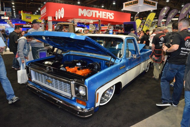Custom cars and trucks on show floor