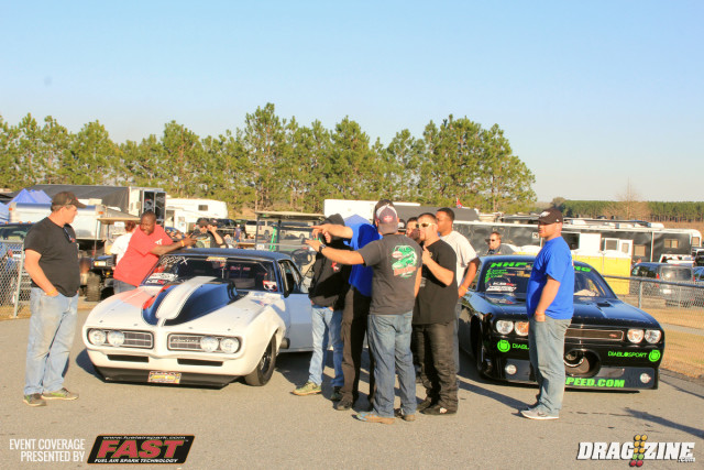 Rob Goss (pictured right next to Charlie Johnson) leads Precision Turbo/KBX X275 after running a 4.396 at 164.53 MPH with his F1X Procharged 2009 Challenger.