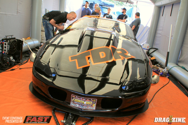 Tommy Rainer is running a Sid Neal TH 400 trans and testing a new gear combination this weekend and installed a Davis Technologies box before the event as well a new 98 MM turbos from Precision. He is not qualified yet but ran 4.40 at 192 MPH getting data to clean up the fuel map with the new set up. He uses a Proline 622 on gasoline with Big Stuff3 tuned by Rainer.