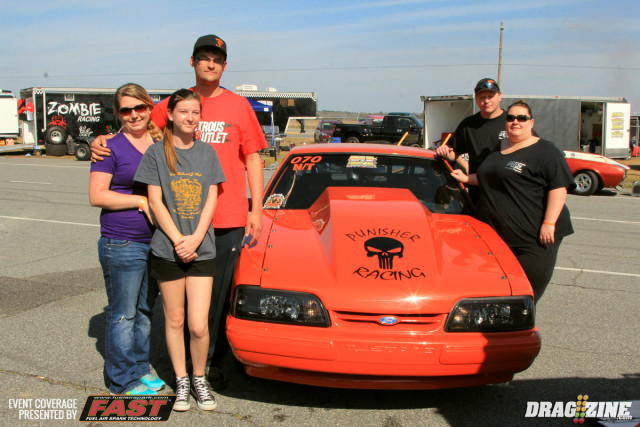Marion, North Carolina based Punisher Racing is here entered two classes with two drivers this weekend running Open Comp and 6.0 Index. We spoke with driver Casey Hollifield about the combo with the team running a stock block 383 Chevy with an NOS plate nitrous system built by Kevin Dalton at Dalton Racing Engines. “I want to thank everyone that has supported us and helped us on the way, Kevin and the team at Dalton Race Engines, Robert and Karen and my wife Kara Wheeler and the other driver Jamie Hannah. From left to right, Julia Boal, Kara Wheeler, Casey Hollifield and Karen and Robert Wylie.” - Casey Hollifield.