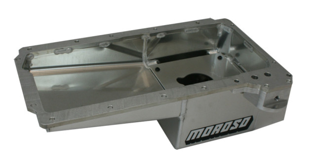 CAPTION - The consumer has to really pay attention to the specifications of the oil pan they are interested in. If the consumer has any intention of taking the vehicle to a road course or even auto cross on a regular basis then they should make sure that the specifications list baffling or trap door baffling. Trap door baffles are designed and positioned to open and allow oil to easily flow toward the pickup and to close to prevent oil from flowing away from the pickup. Under cornering force, the doors will keep the oil from shifting in the pan and keep it at the pickup.