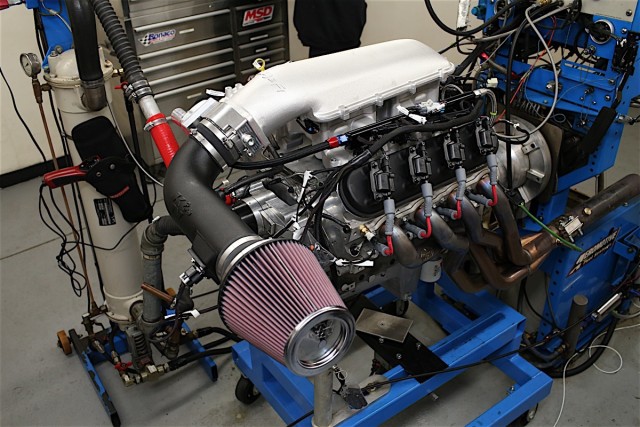 While not as tall as the Hi-Ram, the Holley Mid-Rise sits higher than stock. While it may fit under the stock hood in some applications, it's worth noting that it will take up additional vertical space versus the stock manifold.