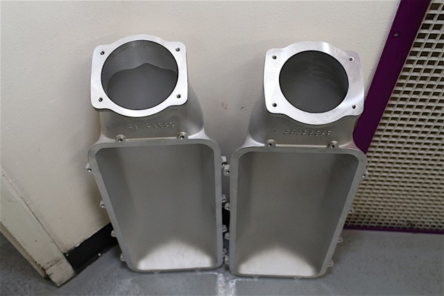 Since the only difference between the tops of the Holley Hi-Ram and the Mid-Rise is the throttle body port size, we decided to use the Hi-Ram's piece rather than the stock Mid-Rise. This allowed us to take full advantage of the 102mm throttle body we'd used for the LSXr and Hi-Ram pulls, rather than choking the throttle body by creating a bottleneck at the intake port with a mismatched combination.