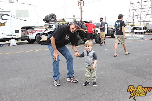 Larry poses for a shot with his grandson, Sawyer.