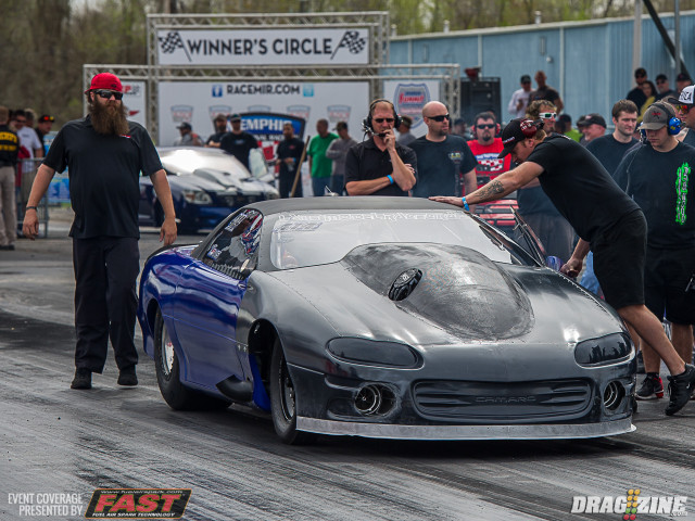 Steven Fereday hauled his Camaro from Houston to compete in Radial vs the World. Fereday's tuner, Josh Ledford (standing at the rear of the car) will have to look at the data and see why the swoopy F-Body lost traction. This team has been low 4.0's so don't expect their 7.53 to hold up.