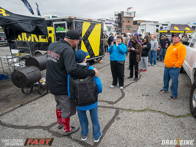 The pit area of Street Outlaw stars Shawn Ellington and Justin Shearer are packed with fans anxious to meet their favorite street racers. Despite fielding a pair of competitive cars, Ellington and Shearer spend as much time as possible meeting and greeting fans.