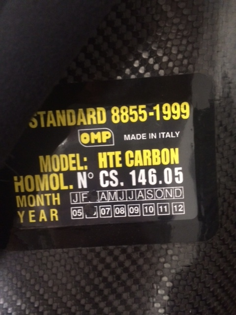 All racing seats with FIA 8855-1999 certification will carry a sticker like this. But keep in mind that even though this sticker may be present that does not guarantee that a seat will pass tech inspection. This one, for instance, is long past its five year expiration date, and would not be eligible for competitve use