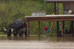 Video: Monster Truck Rescues Neighbors During Flood