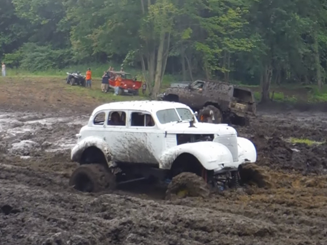 Video: Vintage Sedan Hits the Mud Bog