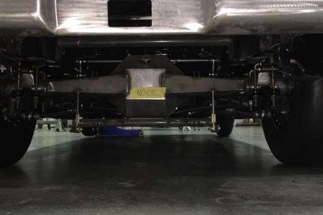 The Moser 9-inch housing boasts gun-drilled 40-spline axles, a bolt-through center section, and 3.50 gears. Nightrain's front suspension is from Scott's Hot Rods, while the rear suspension is made up of Calvert Racing split mono-leafs and CalTrac bars. Menscer shocks from Leaf Spring Unlimited Racing reside both front and rear.
